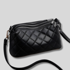 Sac épaule matelassé en cuir noir avec triple fermeture zippée – vue avant