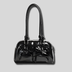 Sac épaule noir brillant avec nœuds décoratifs vue de face – AlluTurne