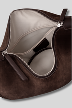 Intérieur du sac Aveline en cuir suédé avec doublure polyester-coton et poche intérieure