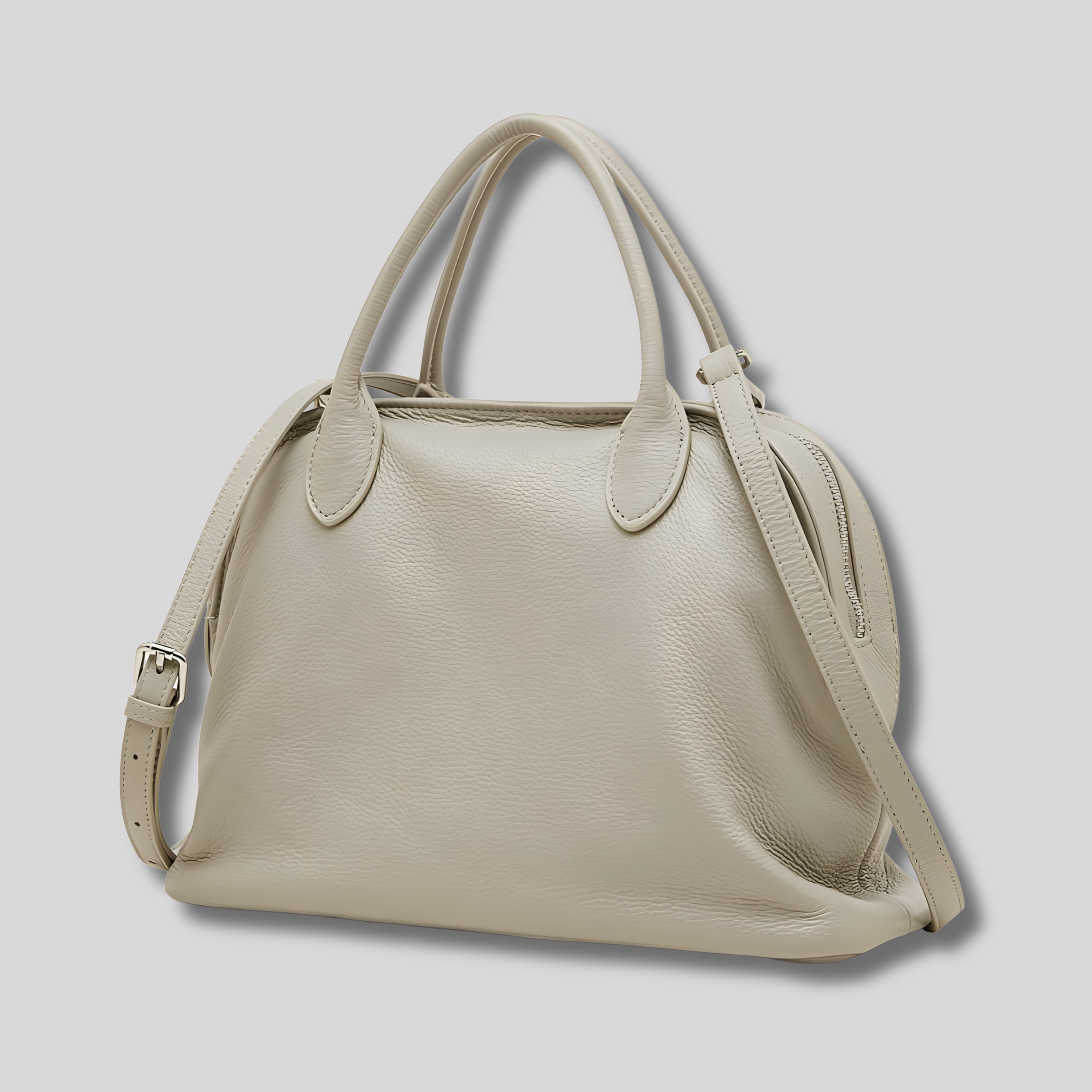 Sac en cuir véritable beige Élyndra avec bandoulière ajustable et anses courtes – vue face