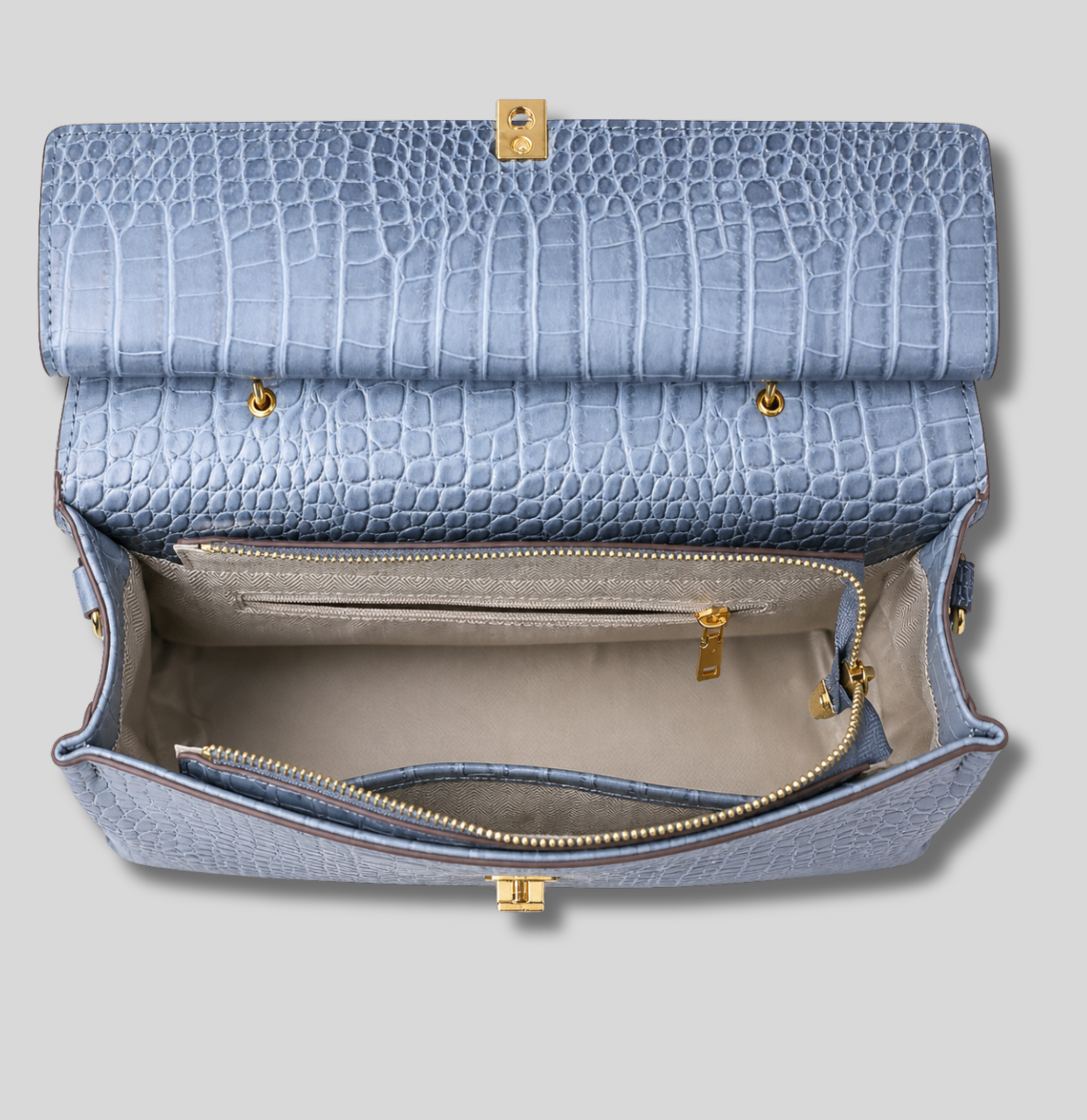 Intérieur du Sac Bandoulière Élysane bleu avec grand compartiment et poche zippée