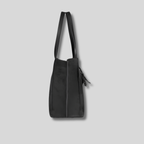 Vue de profil du Sac Cabas Vaélis en suédine noire