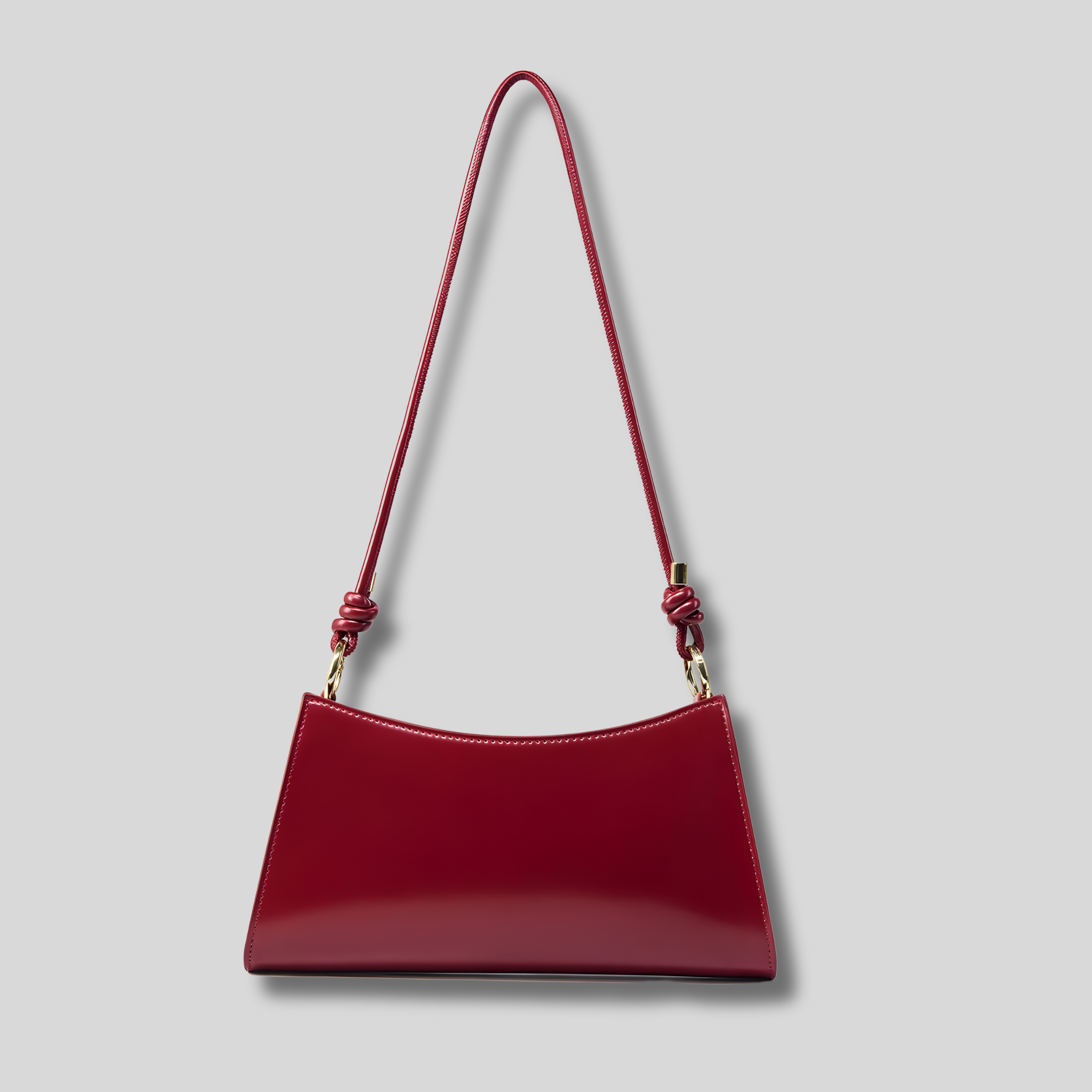 Sac épaule rouge minimaliste pour femme avec bandoulière fine et finition élégante