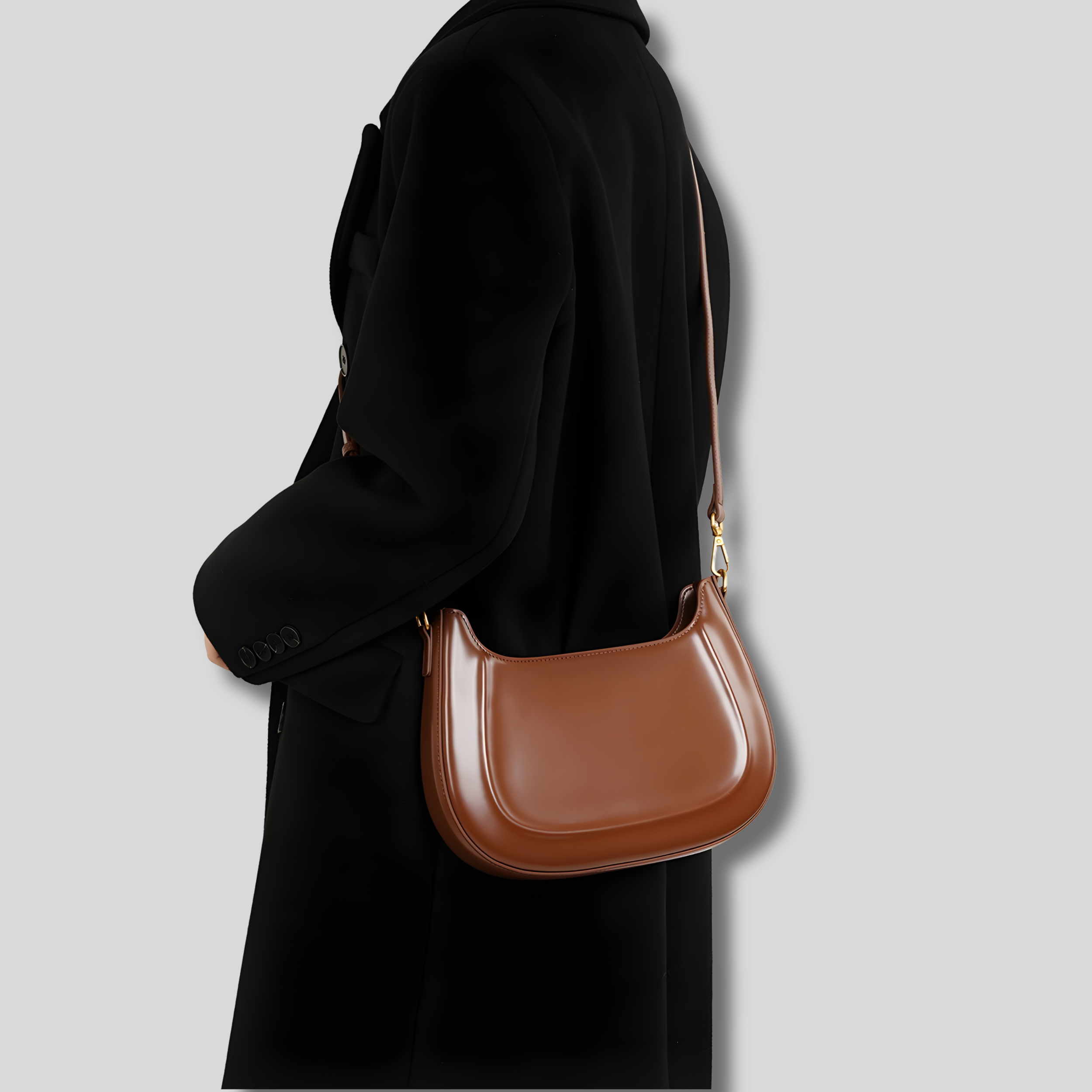 Sac épaule marron porté sur l’épaule avec manteau noir – style élégant quotidien