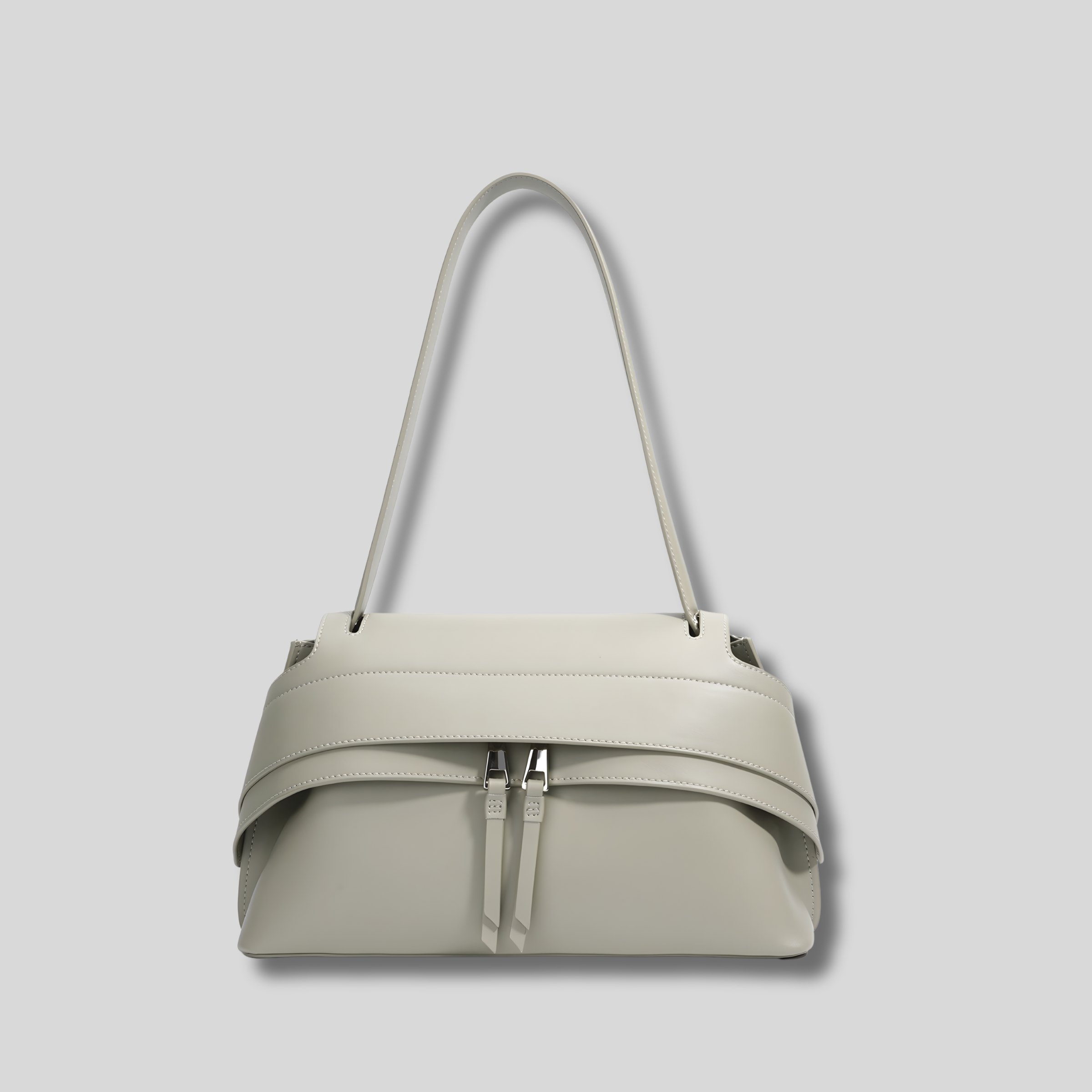 Sac bandoulière gris clair moderne avec double fermeture et silhouette structurée – vue de face