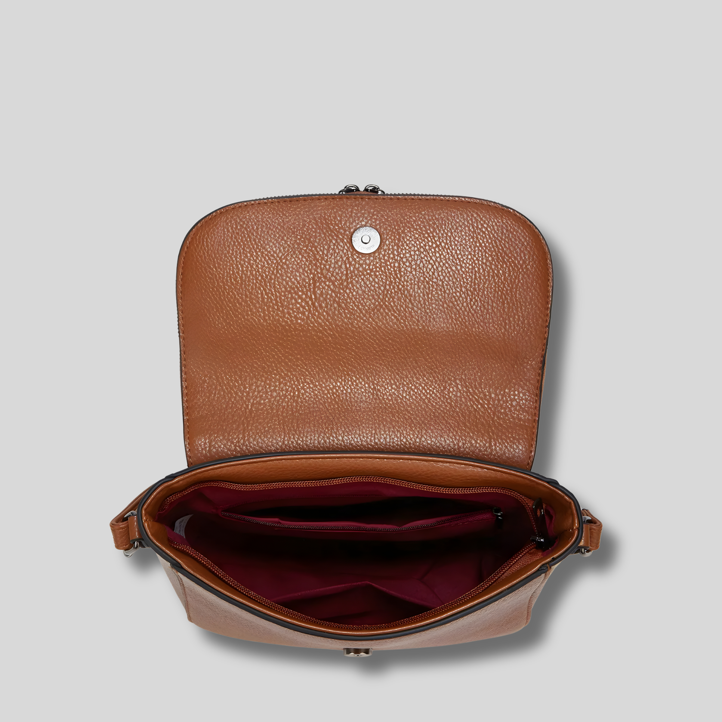 intérieur du sac bandoulière marron avec compartiments ouverts