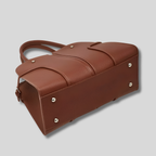 Base renforcée du Sac Cabas Vaélya avec pieds métalliques de protection