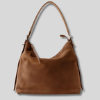 Sac en daim camel vue de face avec silhouette minimaliste et intemporelle