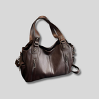 Sac à épaule marron foncé, vue de face, format spacieux avec double fermeture zippée et design structuré