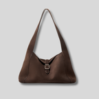 Sac Épaule Ambréa marron en cuir véritable effet daim avec design minimaliste et fermeture à boucle.