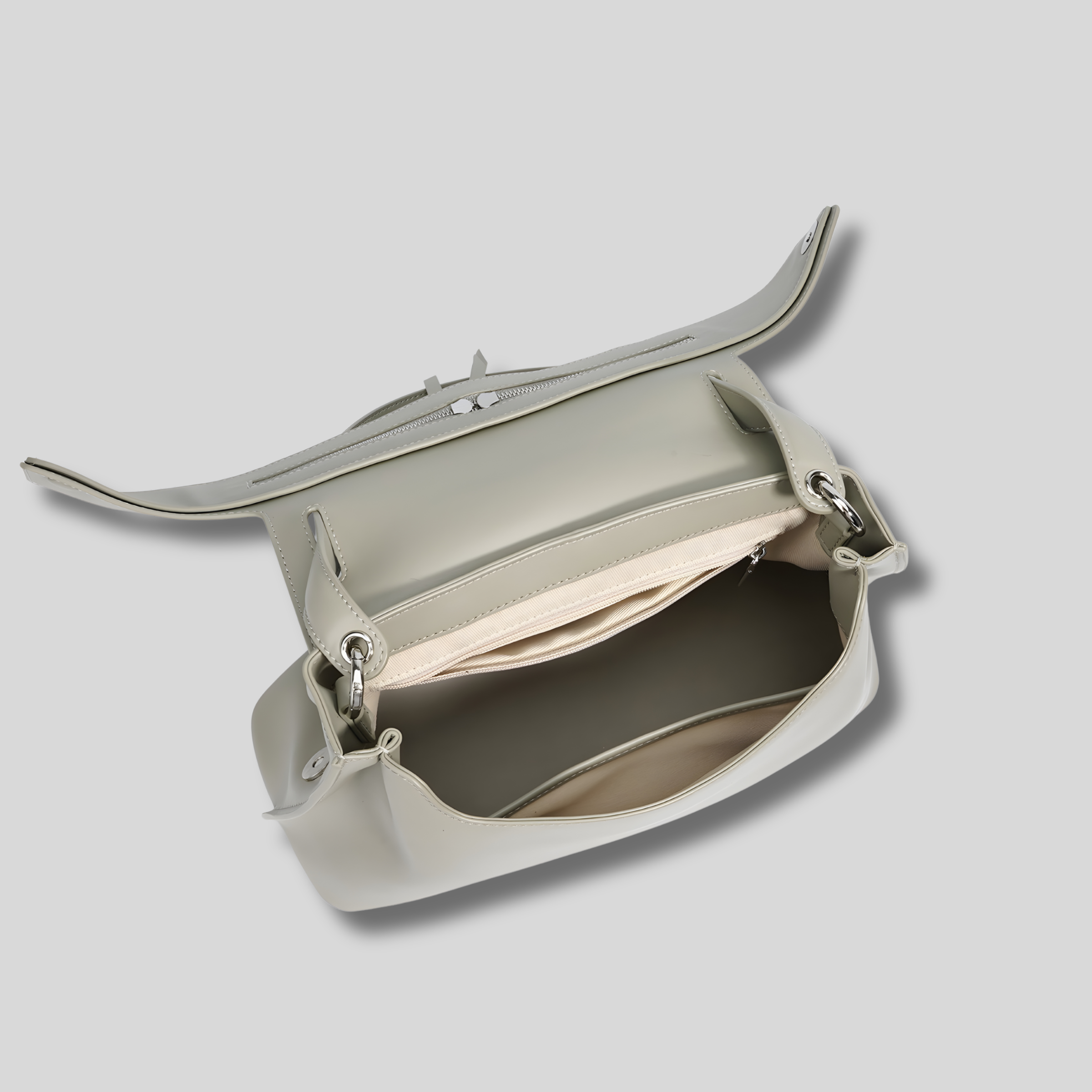 Intérieur du sac bandoulière avec compartiment spacieux et poche zippée – vue ouverte