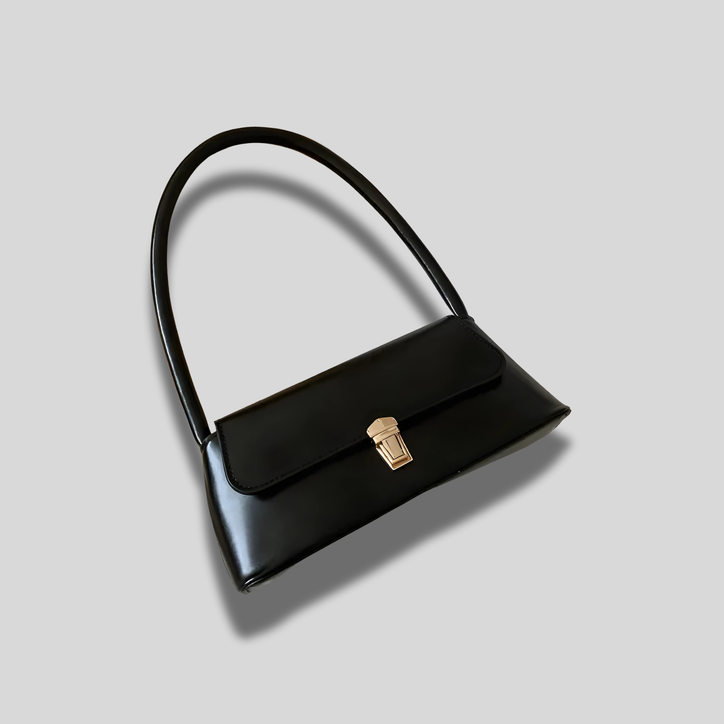 Sac baguette Éloria noir, sac à main élégant et structuré, parfait pour un look sophistiqué.