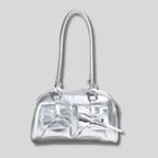 Sac épaule argent métallisé brillant avec nœuds décoratifs vue de face – AlluTurne