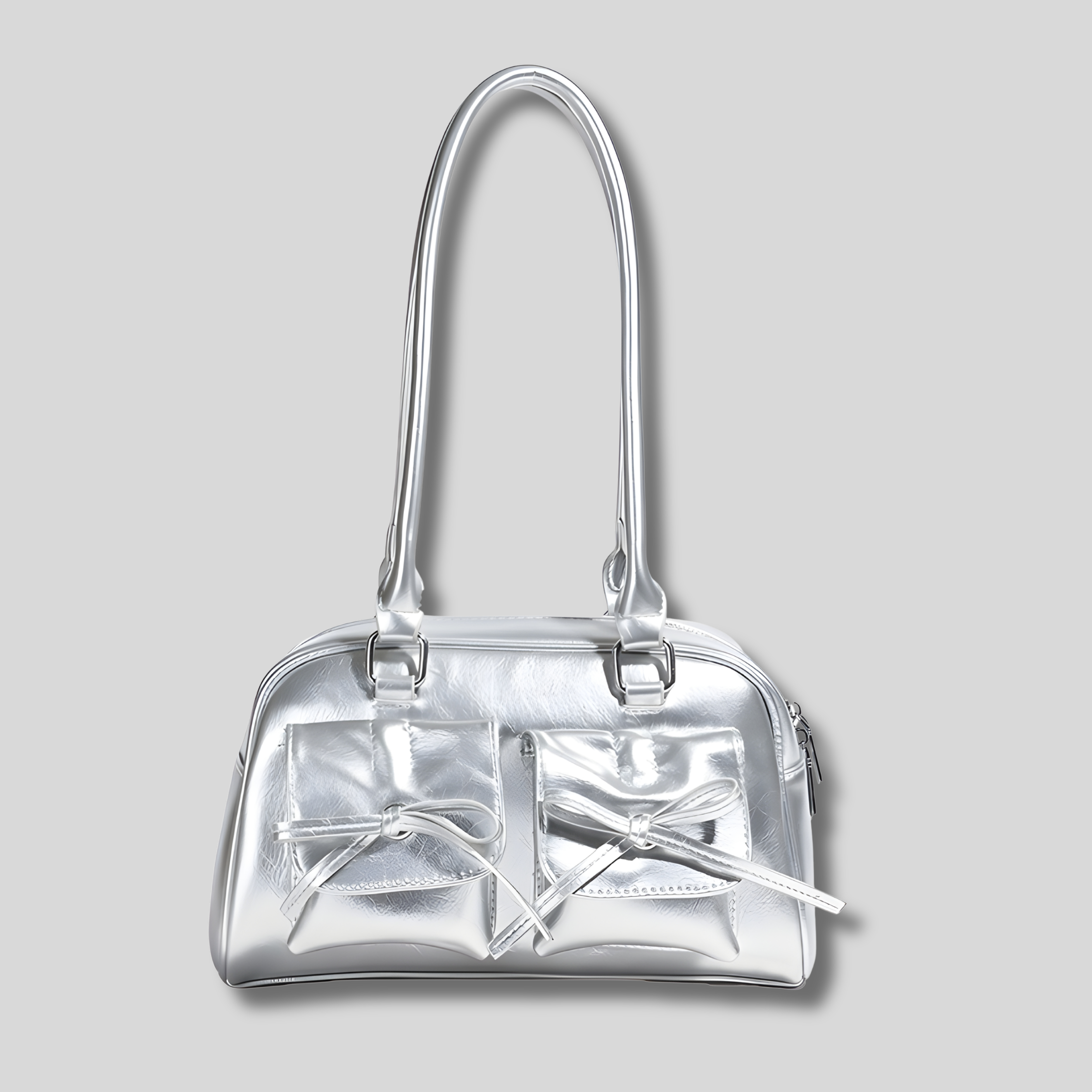 Sac épaule argent métallisé brillant avec nœuds décoratifs vue de face – AlluTurne