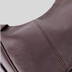 Détail du cuir véritable du Sac Épaule Rovelle avec finition lisse et coutures élégantes