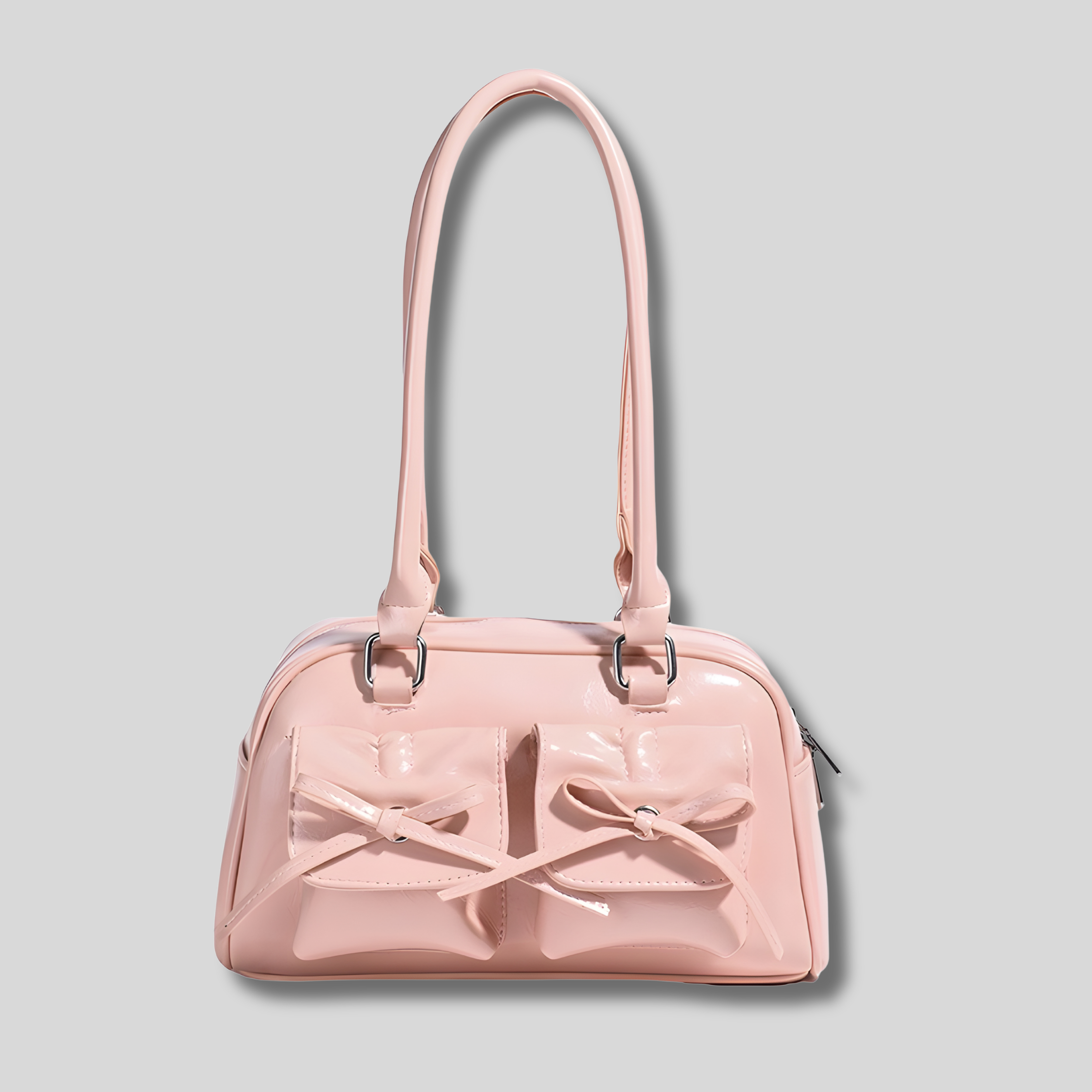 Sac épaule rose brillant avec nœuds décoratifs vue de face – AlluTurne