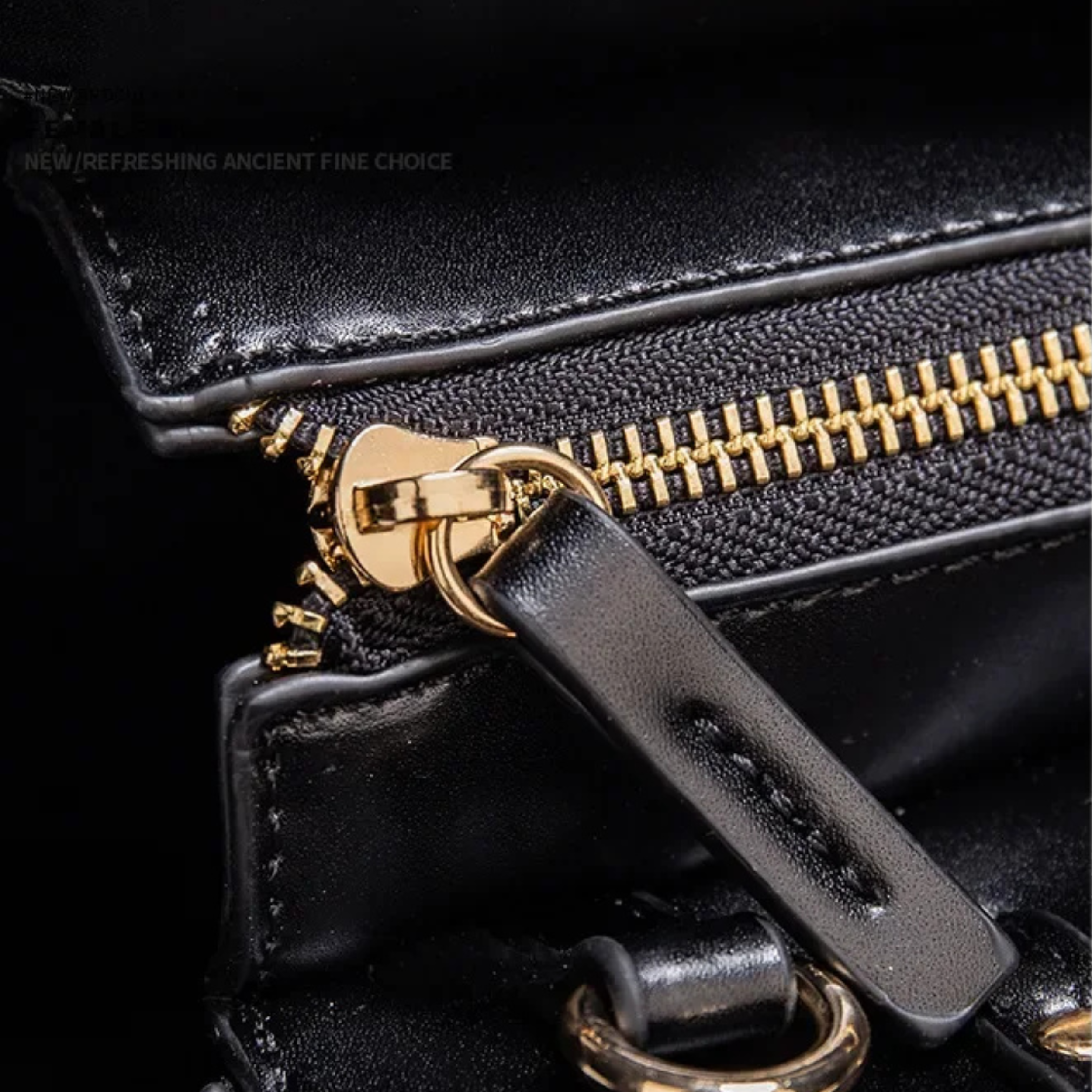 Détail de la fermeture éclair dorée du Sac Cabas Virelia noir