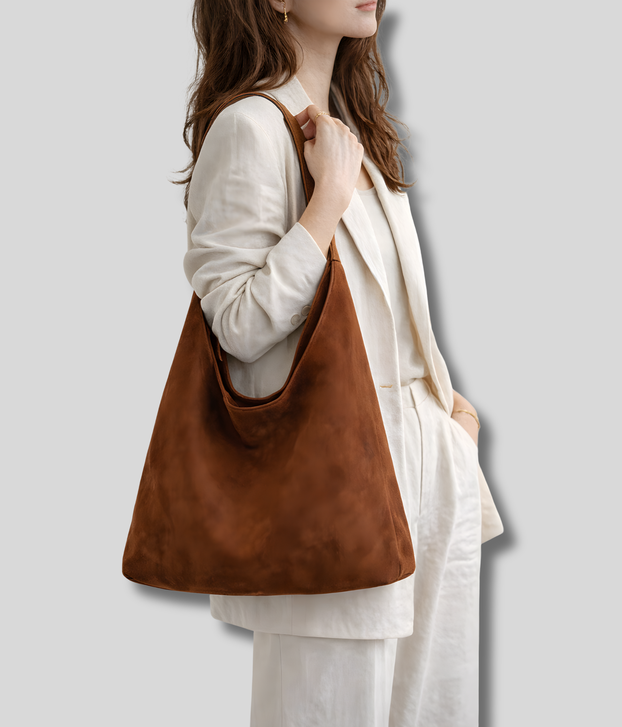 Sac cabas marron porté à l’épaule look élégant et moderne