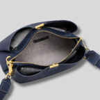 Intérieur du Sac Bandoulière Cuir Orélia bleu avec compartiment principal zippé et doublure textile