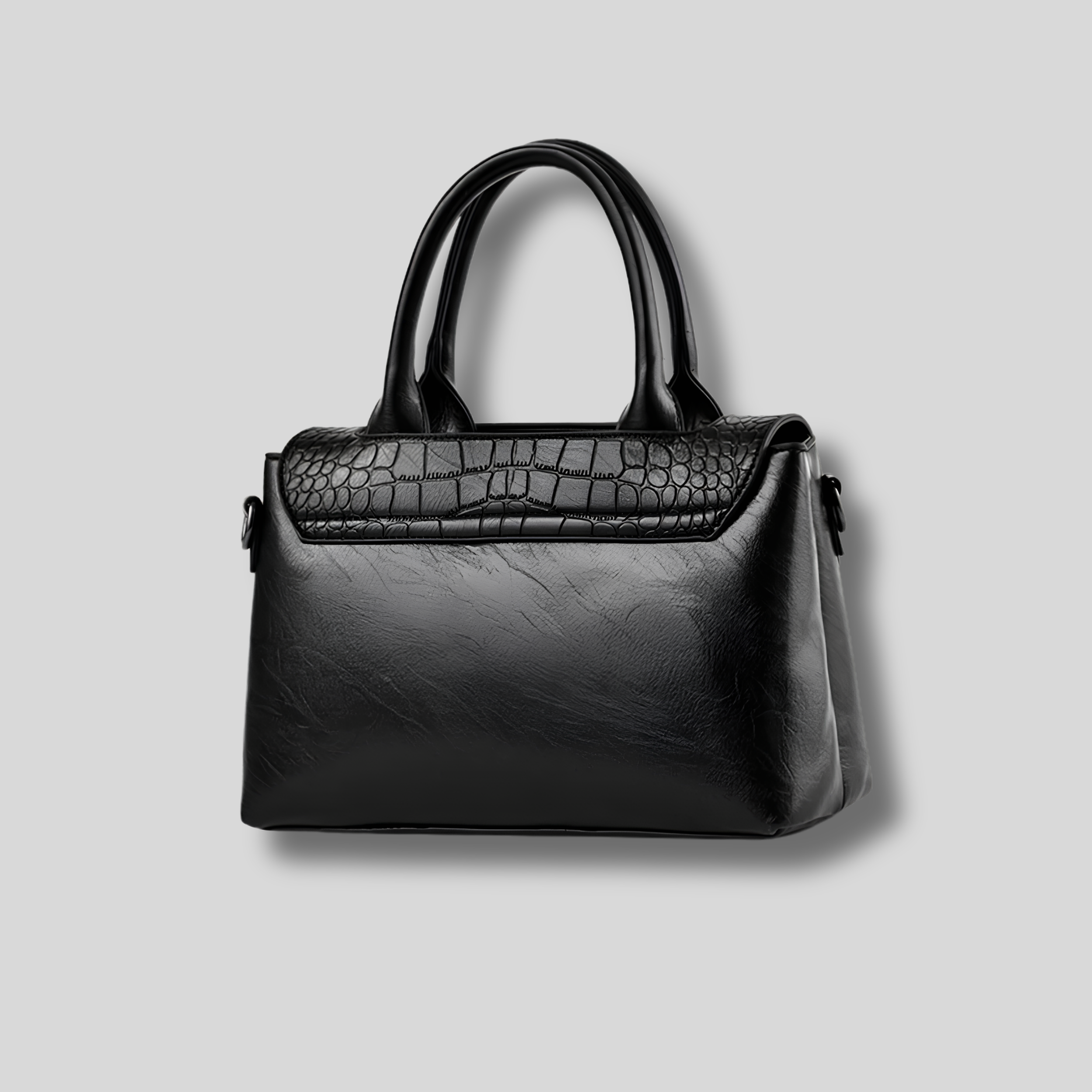 Noir – Base renforcée du sac Crocélya avec détails élégants et finition structurée