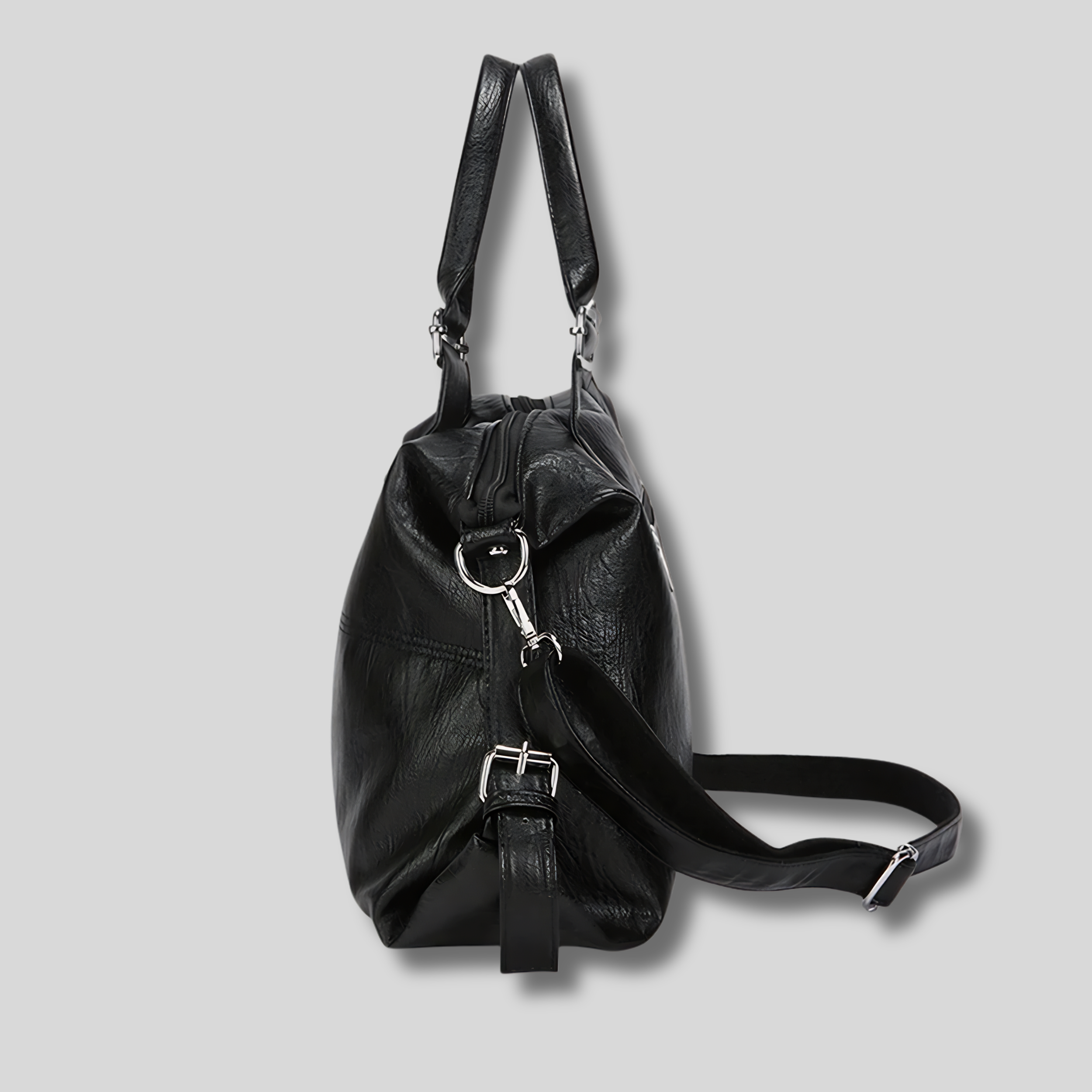 Sac cabas cuir noir vue latérale avec bandoulière ajustable