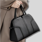 Sac Cabas Vaélya noir porté à la main – style élégant du quotidien
