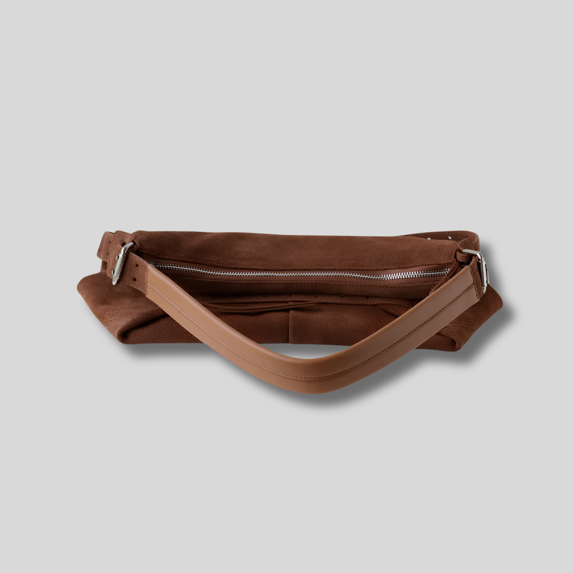 Vue supérieure du sac avec fermeture zippée et anse ajustable